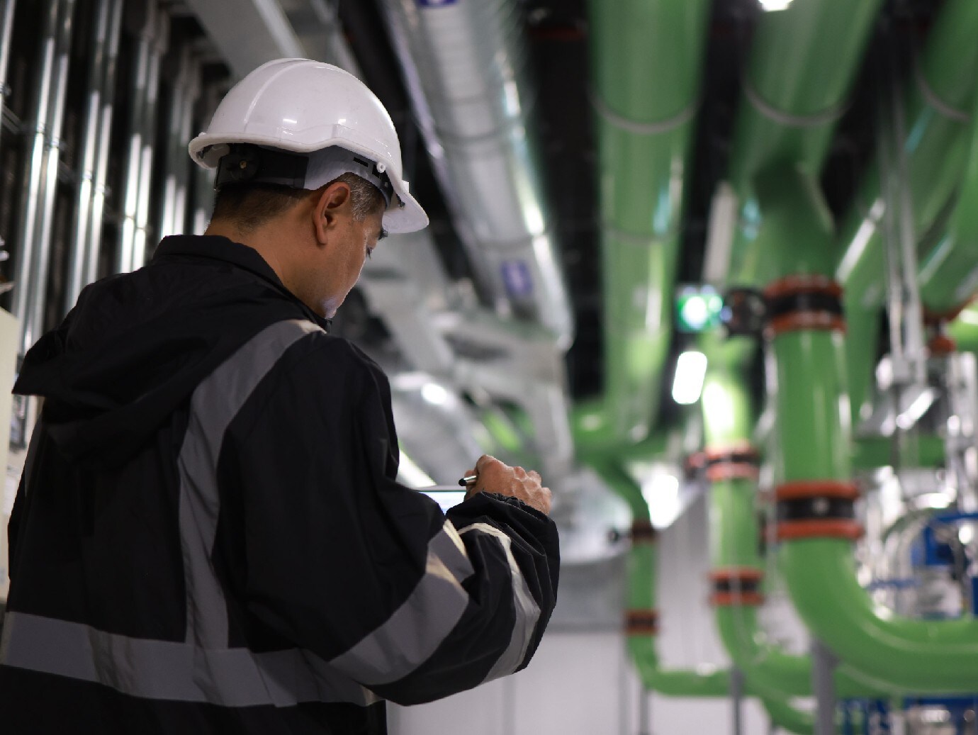 A worker working in a manufacturing plant.