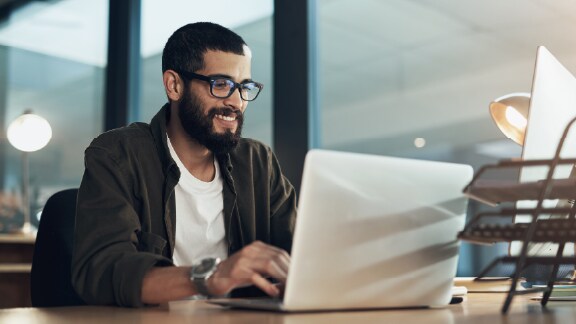 Image of man using laptop
